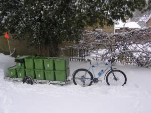 Myke's bike getting ready on a snowy morning.