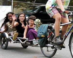 Girls waving on trailer at Cummington Fair