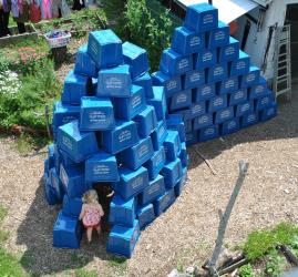Stella enters the recycling tote castle